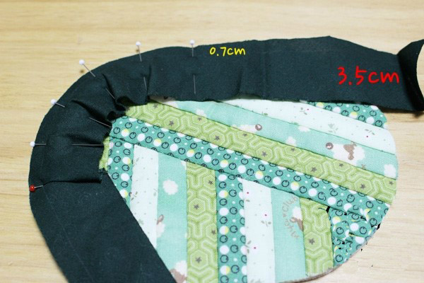 This zip pouch is made with scraps sewn together to form panels, DIY Tutorial