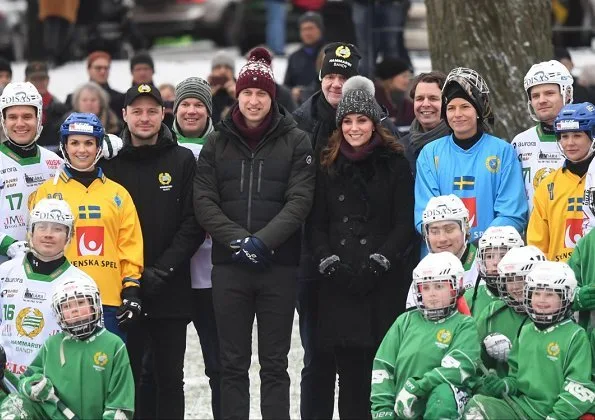 Kate Middleton wore Burberry Double breasted suede trench coat at a Bandy hockey match at Vasaparken in Stockholm