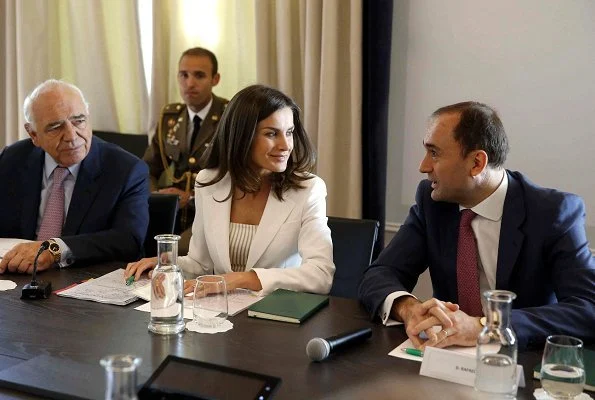 Queen Letizia looked radiant in white, debuting a crisp wide leg pantsuit by Carolina Herrera