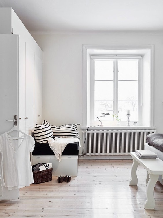 Rincón de lectura en habitación matrimonio