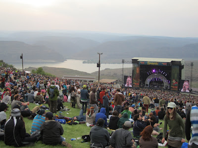 Photo of concert stage in front of mountains