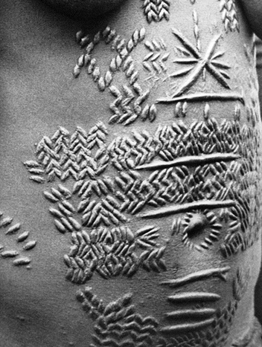 Scarification - Body modification | Scarification, Scarification tattoo ...