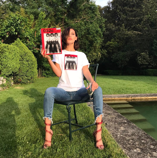 Bella Hadid Sitting in Jeans