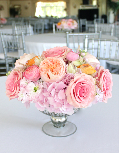 sweet pea floral design coral peach pink garden rose juliet ranunculus andromeda astilbe roses stock in mercury glass compote for barton hills country club ann arbor wedding reception guest table centerpieces