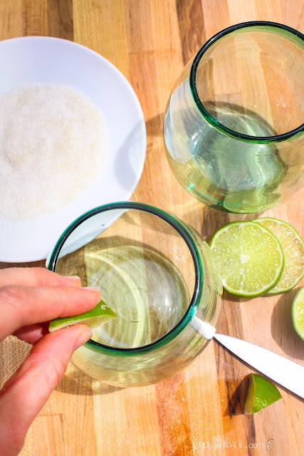 salting the rim of the margarita