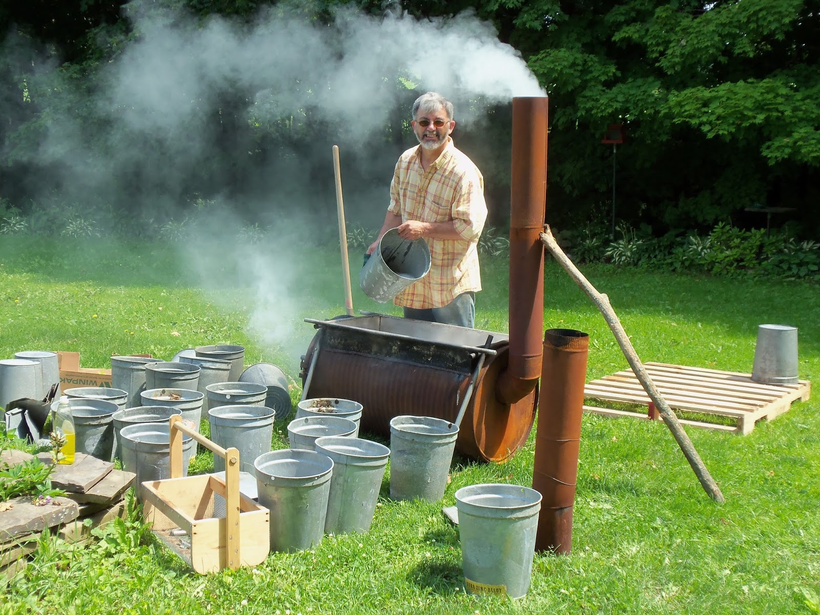 The Deliberate Agrarian Cleaning Sap Buckets inAlmostJuly