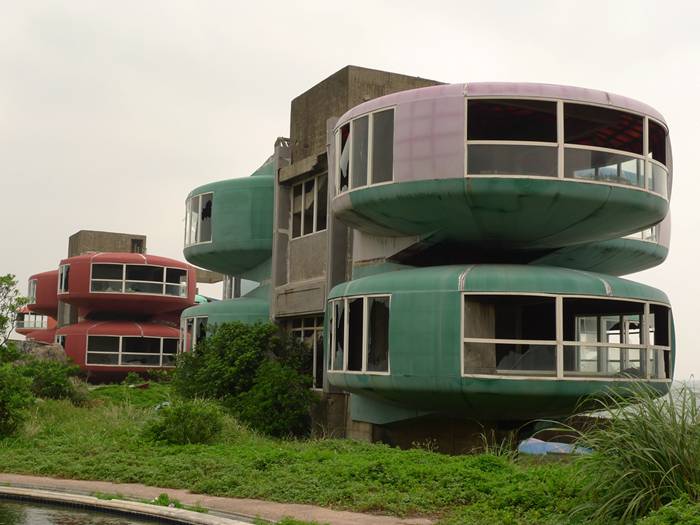 Sanzhi UFO houses, also known as the Sanzhi pod houses or Sanzhi Pod City, were a set of abandoned pod-shaped buildings in Sanzhi District, New Taipei City, Taiwan. The buildings resembled Futuro houses, some examples of which can be found elsewhere in Taiwan. The site where the buildings were located was owned by Hung Kuo Group.