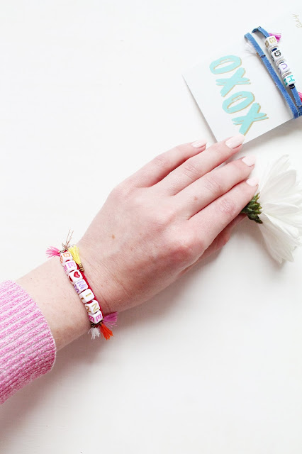Use colorful letter beads to make personalized bracelet Valentines for friends and classmates.