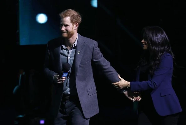 The Duchess of Sussex, Meghan Markle wore a new navy cashmere jacket by Ralph Lauren