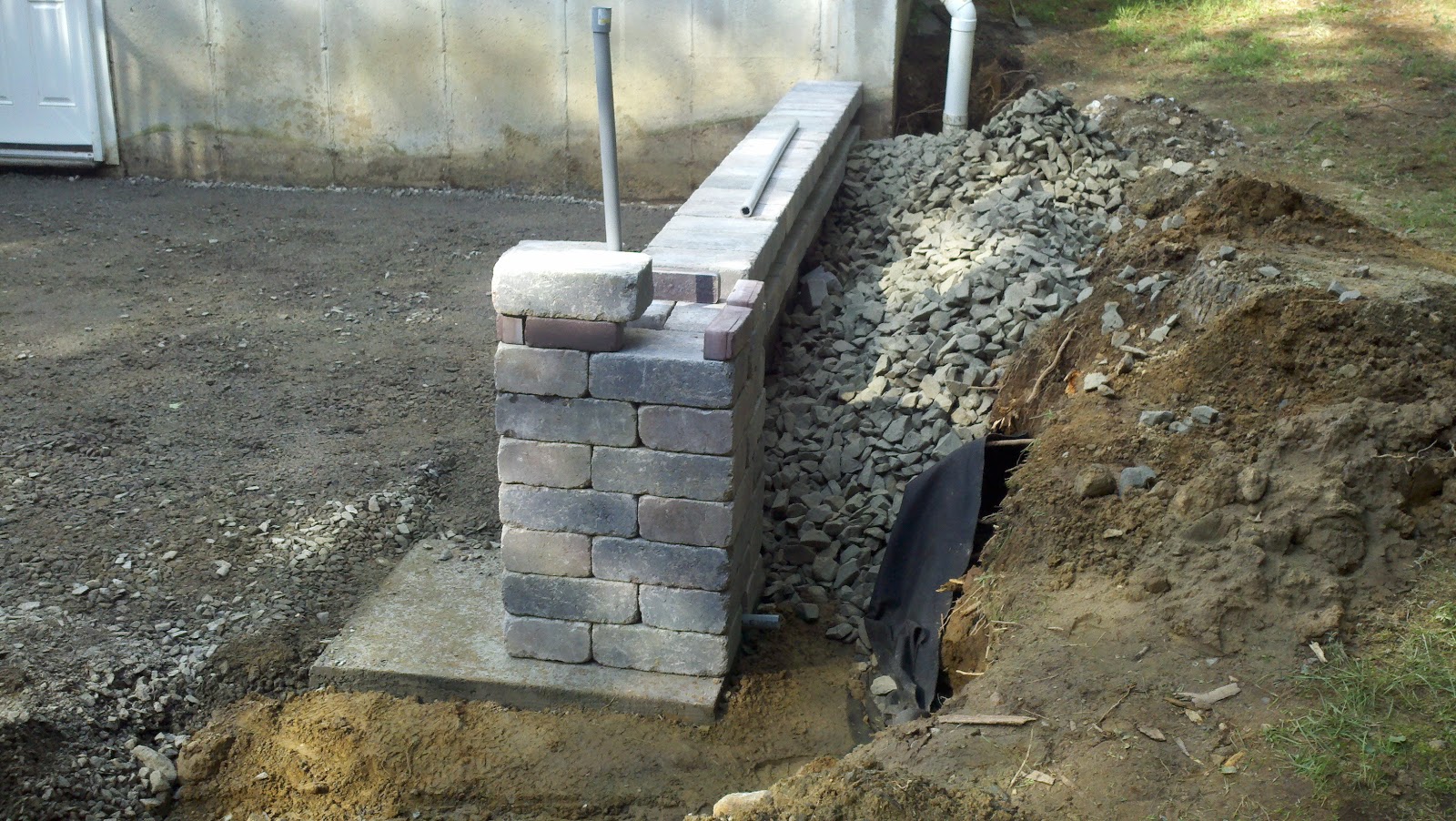 A Changing Home Transform the Yard! A Patio, Wall, Walkway Story