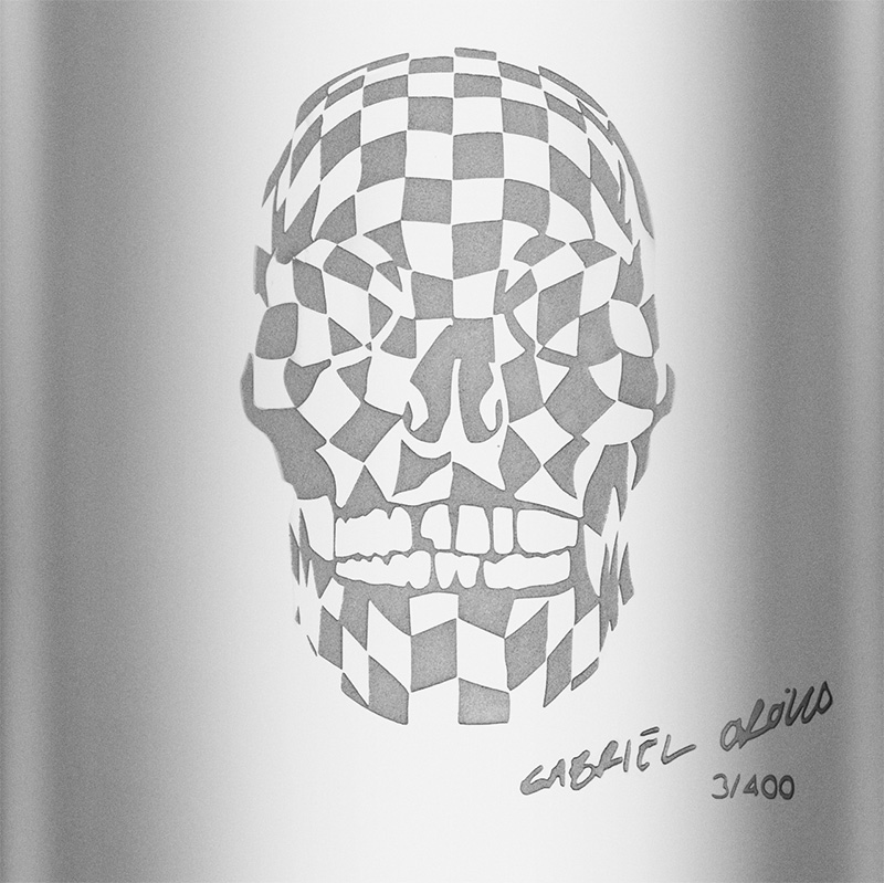 etched skull in glass bottle
