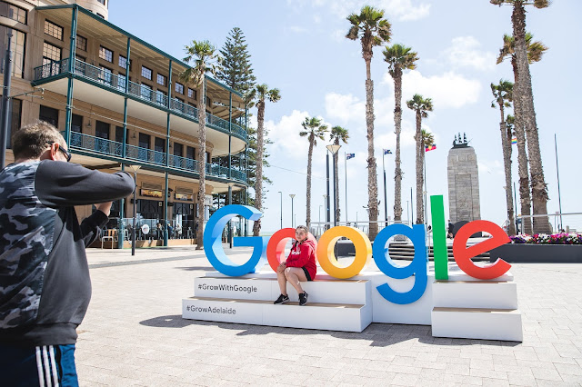 Photos of Kangaroo Island locals in front of Grow with Google signage