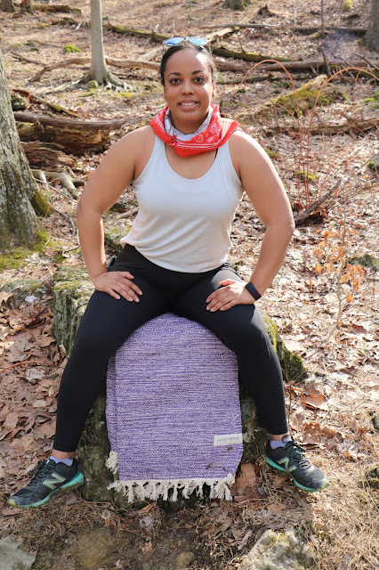 Black woman yogi in the woods