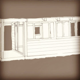 Sketch of a two-room holiday home with sliding doors and patios on each side and windows across the front.