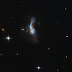 A collision of galaxies, IRAS 14348-1447, seen by Hubble