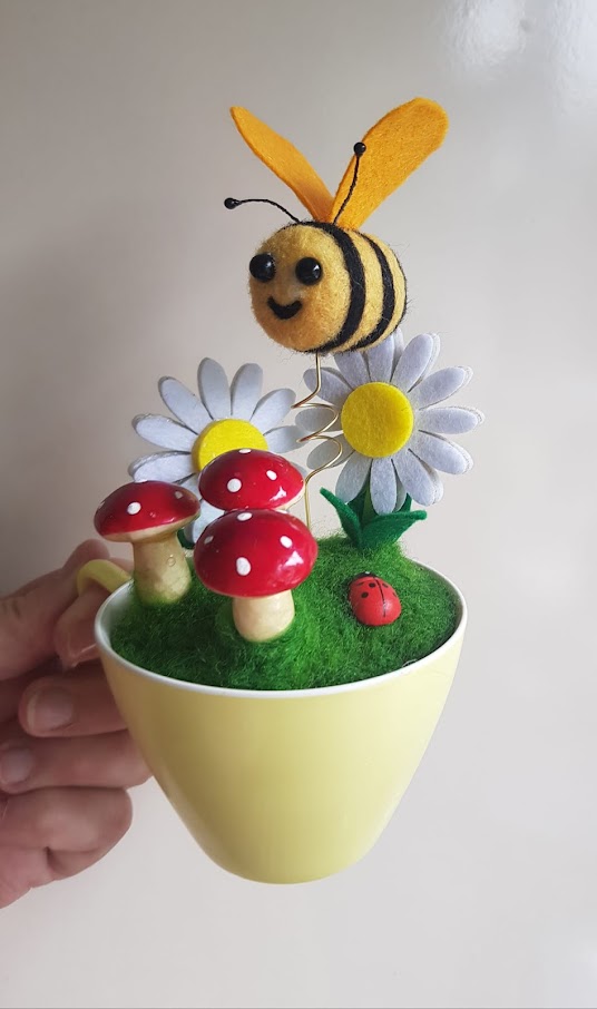 needlefelt bee in flowerpot