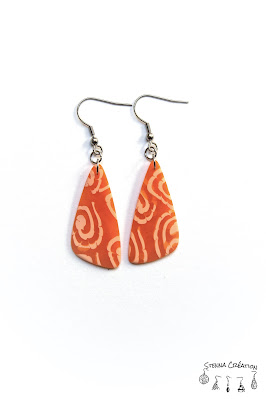 Boucles oreilles pâte polymère spirale orange Stenna Création Fimo