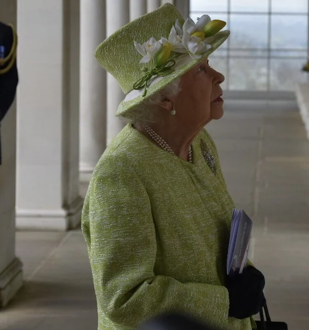 Queen Elizabeth, wearing a lime green coat and the Wattle brooch presented to her on first tour of Australia in 1954