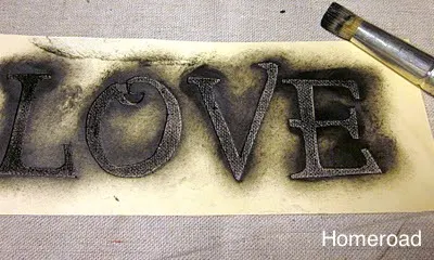 stenciling with a LOVE stencil