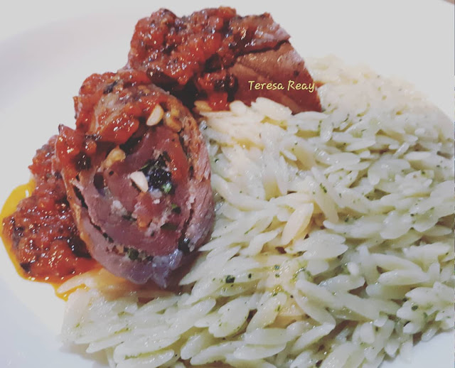 SICILIAN VEAL INVOLTINI WITH HERBED RISONI, ROAST TOMATO AND OREGANO SAUCE