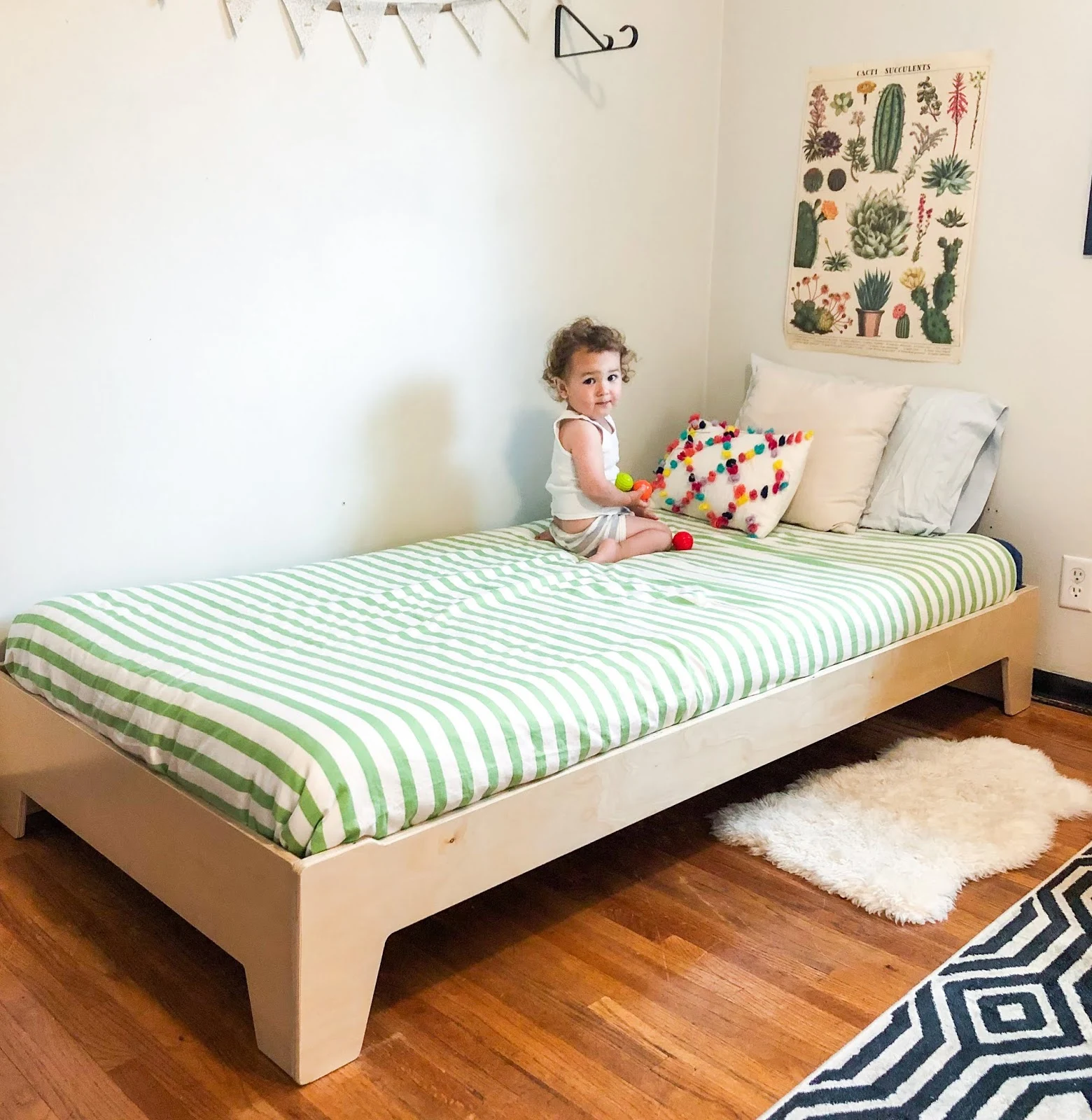 Thoughts on why your toddler may need a Montessori floor bed to promote freedom of movement and independence.