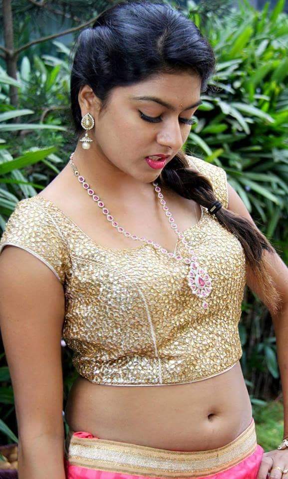 Hot Telugu Acress In Golden Blouse Exposing Navel With
