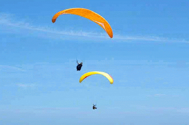 blue sky, paragliders