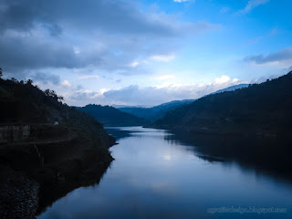 Wide Natural Landscape Of Dams Reservoir Water Storage Between Hills In The Cloudy Sky At Ularan Village North Bali Indonesia