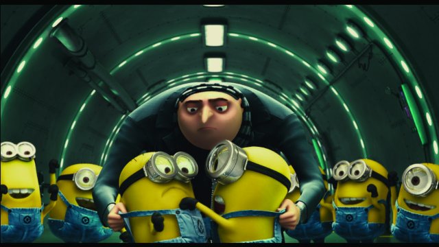 Gru watching his minions in Despicable Me animatedfilmreviews.blogspot.com