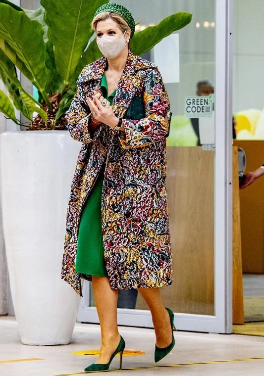 Queen Maxima wore a long floral brocade coat from Oscar de la Renta. and new green dress from Natan