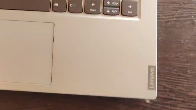 Fingerprints on the smooth plastic surface of this laptop.