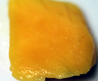 A slice of fresh mango.