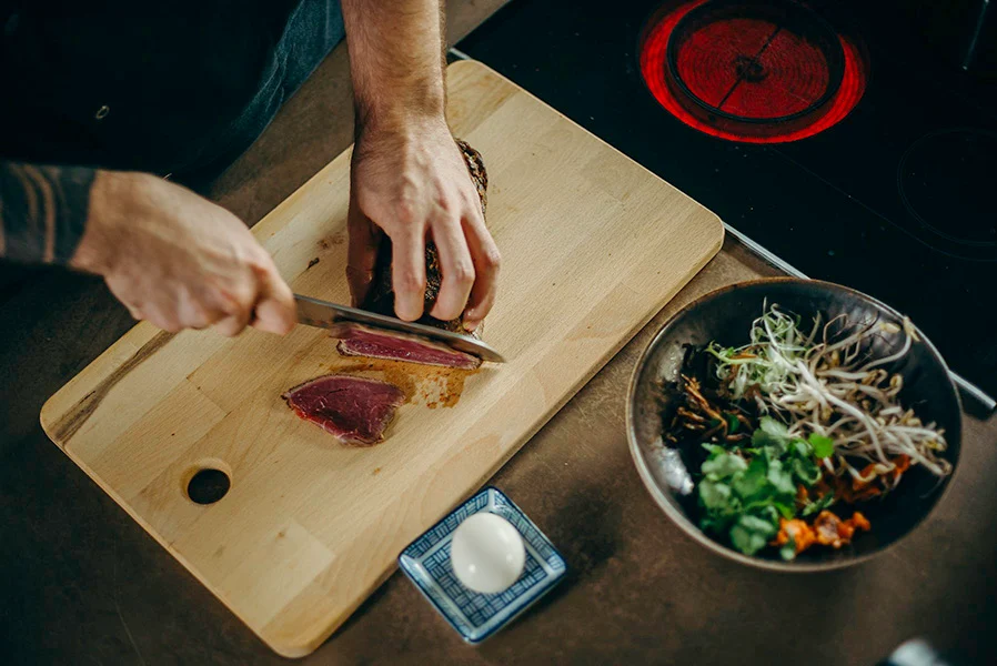 Sharp knife cutting steak