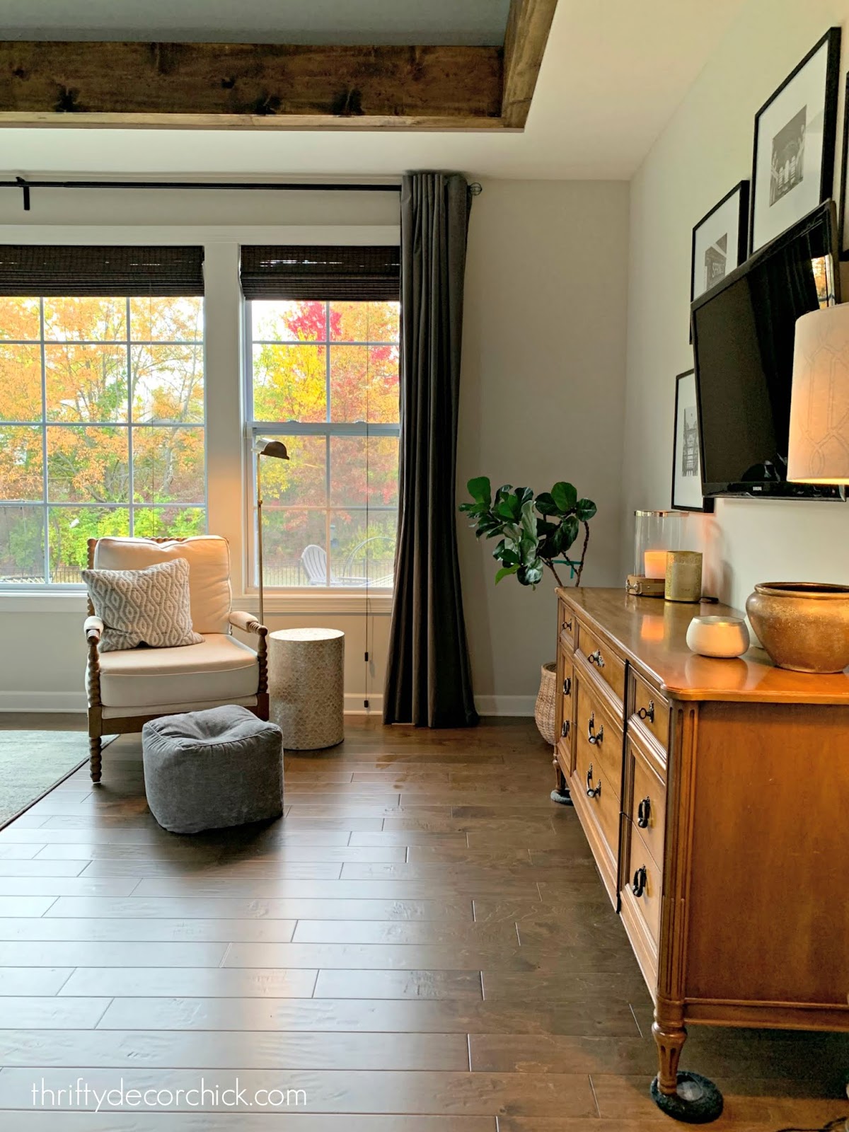 hardwoods dark drapes master bedroom 