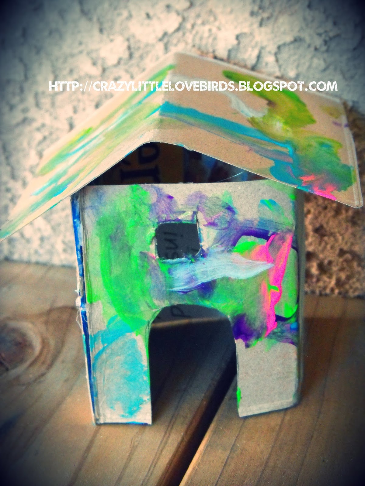 Painted cardboard houses and baked goodies
