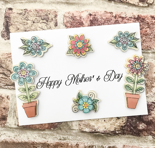 Made card with Happy Mother's Day across the centre, surrounded by flowers
