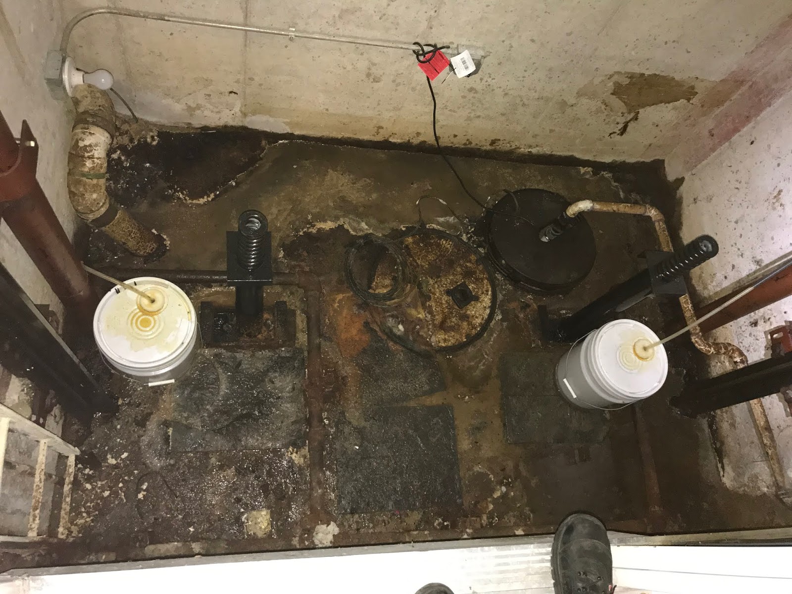 Chicago Elevator Maintenance Colley Elevator Water damage in elevator pits