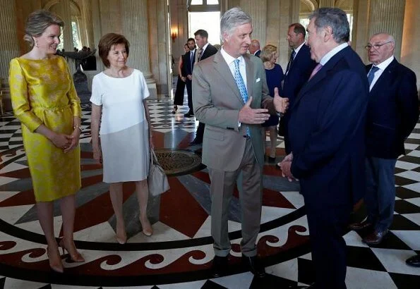 Queen Mathilde wore a yellow belted Natan dress. start of the 106th edition of Tour de France cycling race in France