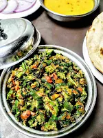 Serving bhindi ki sabji bhindi fry with dal and roti