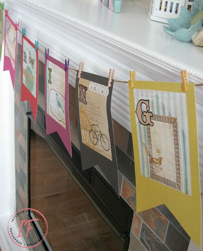 A DIY Vintage-Style Spring Banner easy dollar store craft perfect for a simple Spring paper garland to hang on a fireplace, mirror, or chalkboard.