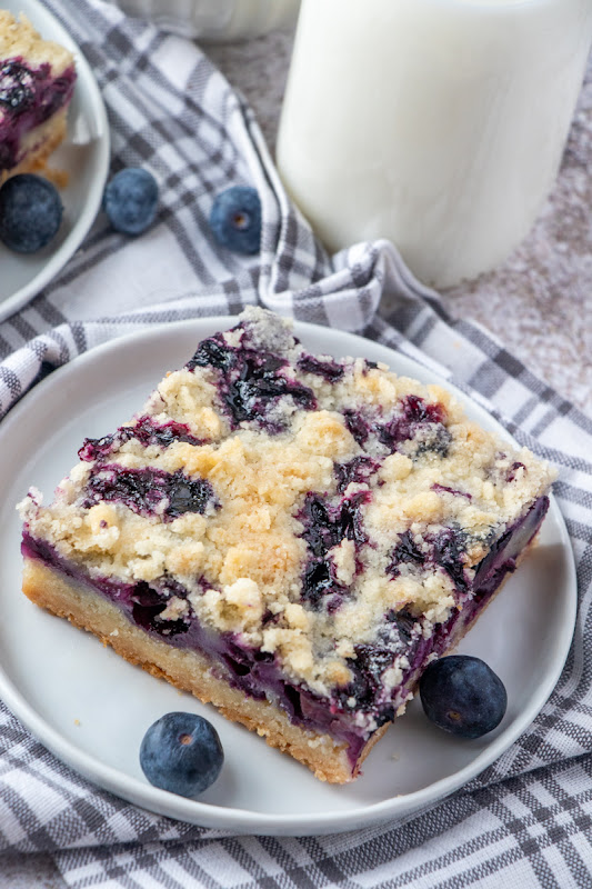 These berry pie bars are a tasty dessert that's great for bake sales, spring and summer picnics, parties and of course, after dinner! Also delicious with cherries, raspberries, blackberries or strawberries!
