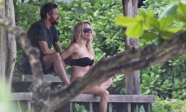 Pamela Anderson at Hawaiian Beach in Black Bikini Photos