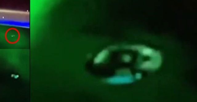 Disc shaped alien spacecraft flying through the northern aurora  Alien-spacecraft-iss