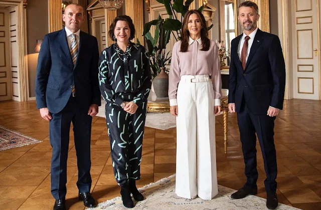 Crown Princess Mary wore high-waisted wide-leg trousers by Proenza Schouler. Sophie Bille Brahe Boucle gold diamond earrings