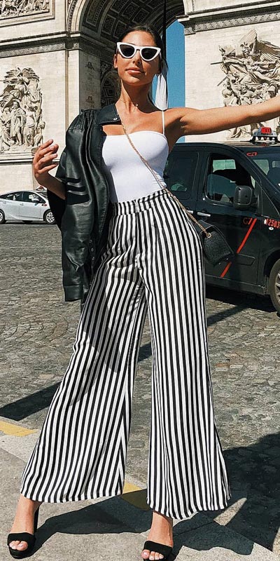 kickstart this season with these 24 charming street style summer fashion ideas. Summer Outfits via higiggle.com | #streetstyle #summeroutfits #fashion #trouser