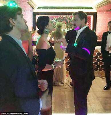 6 Actor Leonardo DiCaprio can't keep his eyes or hands off mystery lady at party (photos)