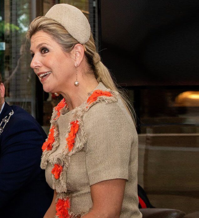 Queen Maxima's outfit is from the fashion house Natan. Natan top and trousers