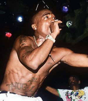 Tupac_Shakur_(rapper),_performing_live.jpg
