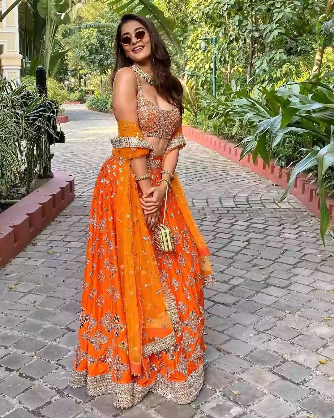 pooja-hegde-in-orange-lehenga pooja-hegde-in-orange-lehenga