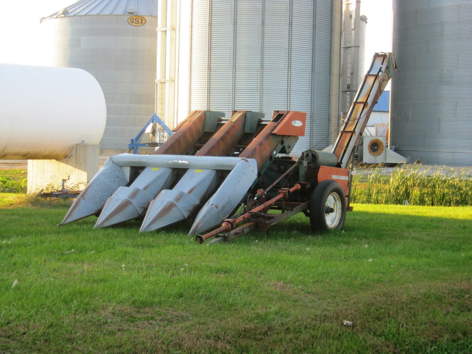 Observations in Agriculture: 3 row corn picker